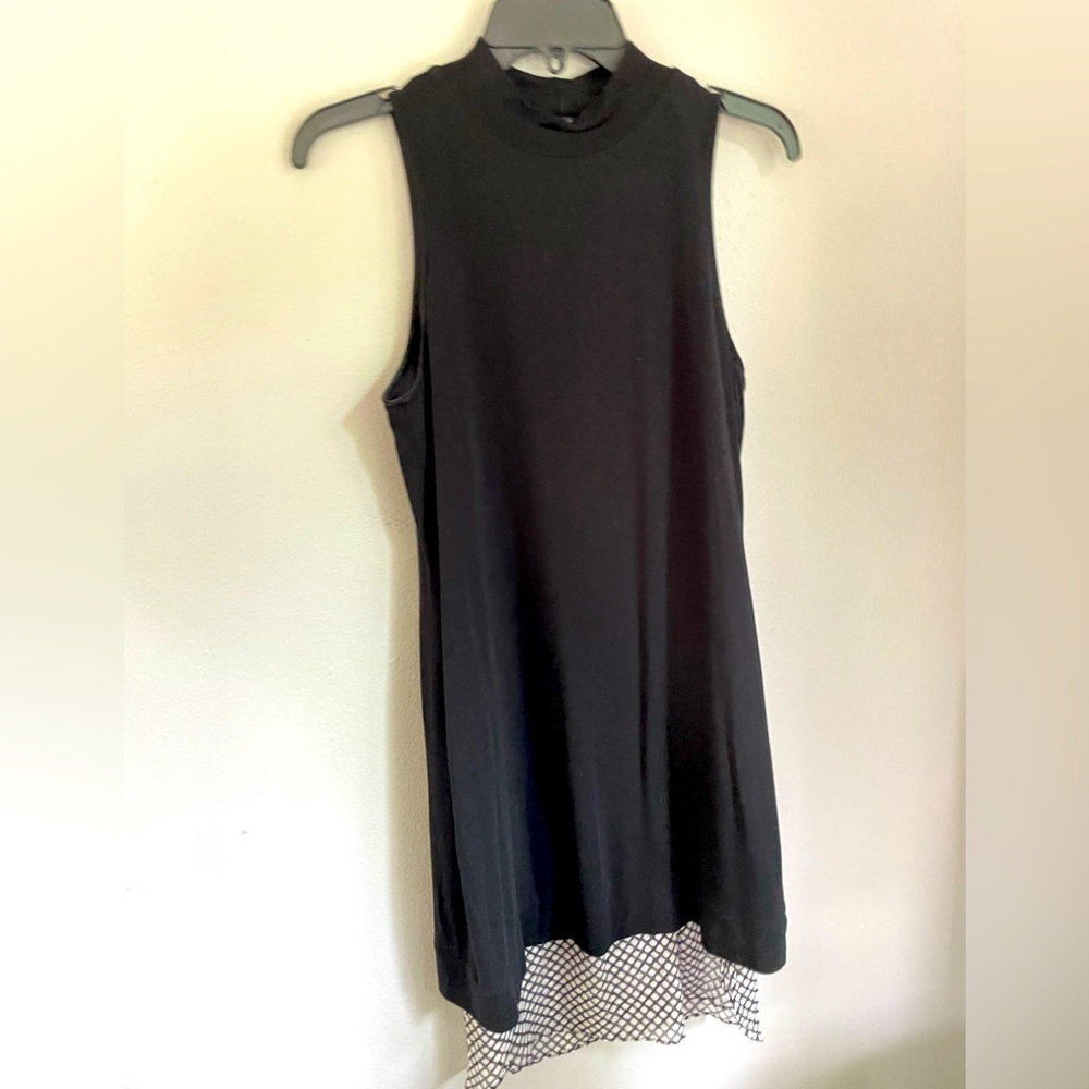 Red Haute black knit sleeveless dress with under skirt. 3 / $15 on this item!